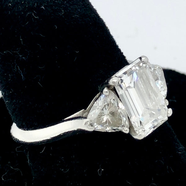 Stunning Platinum Engagement Ring with GIA Certified 1.99 Emerald Shaped Diamond Flanked by a Trillion on Each Side  CR0280